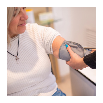 Image of a person getting their blood pressure monitored